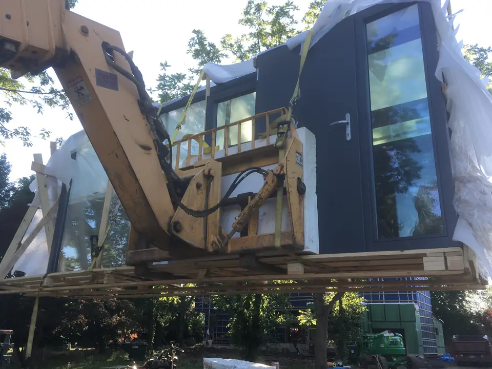Main entrance door with huge picture window being delivered