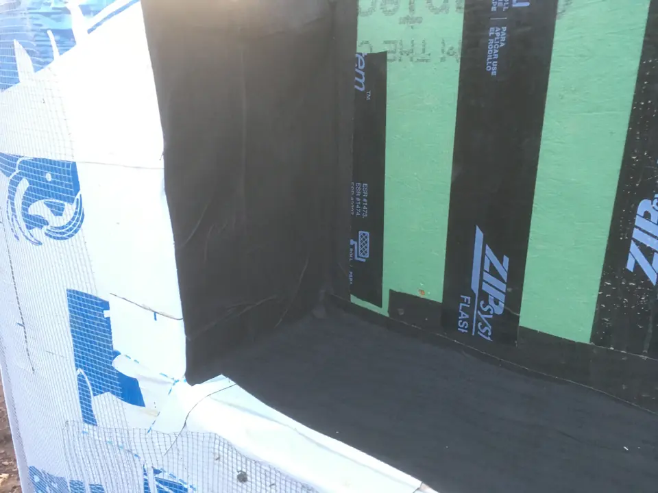 Another example of a sealed connection at the sill plate level. It is ok to over-patch at trouble spots like corners, roof connections, and 