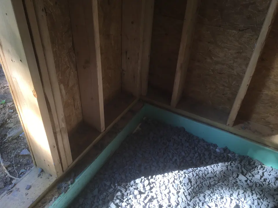 A thermal break is shown around the garage foundation. The garage is not a part of the passive house structure but supports the master bedro