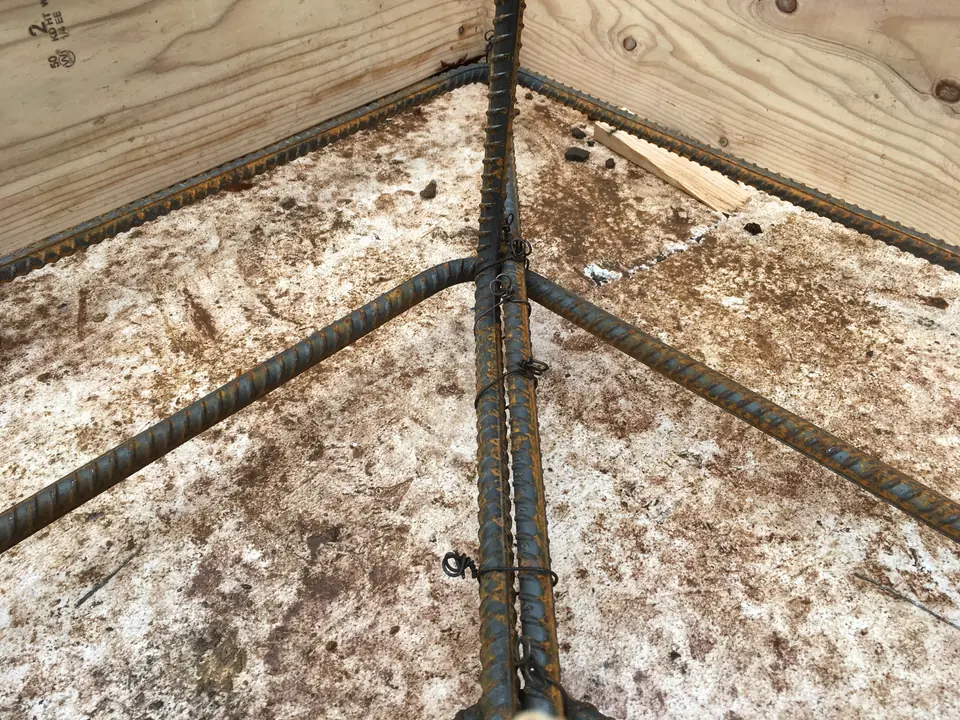 The rebar system for the future footings is set up on top of the foam blocks.