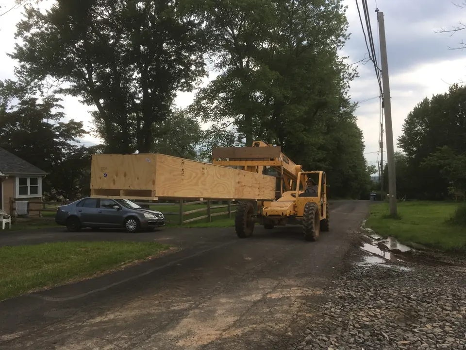 One of the two packages our staircase beams came in. Each weighing about a thousand pounds, they took a crew of seven people to install. And