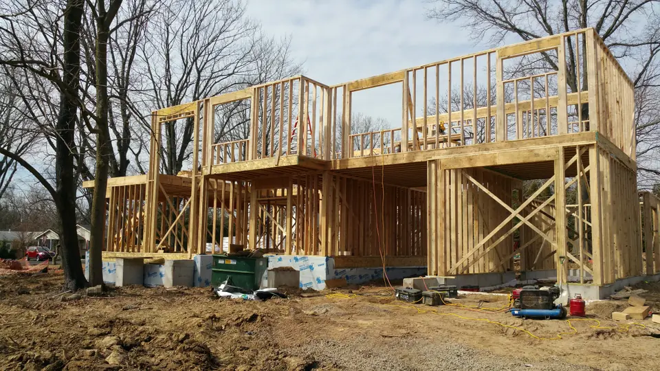 Second-floor wall construction is in progress.
