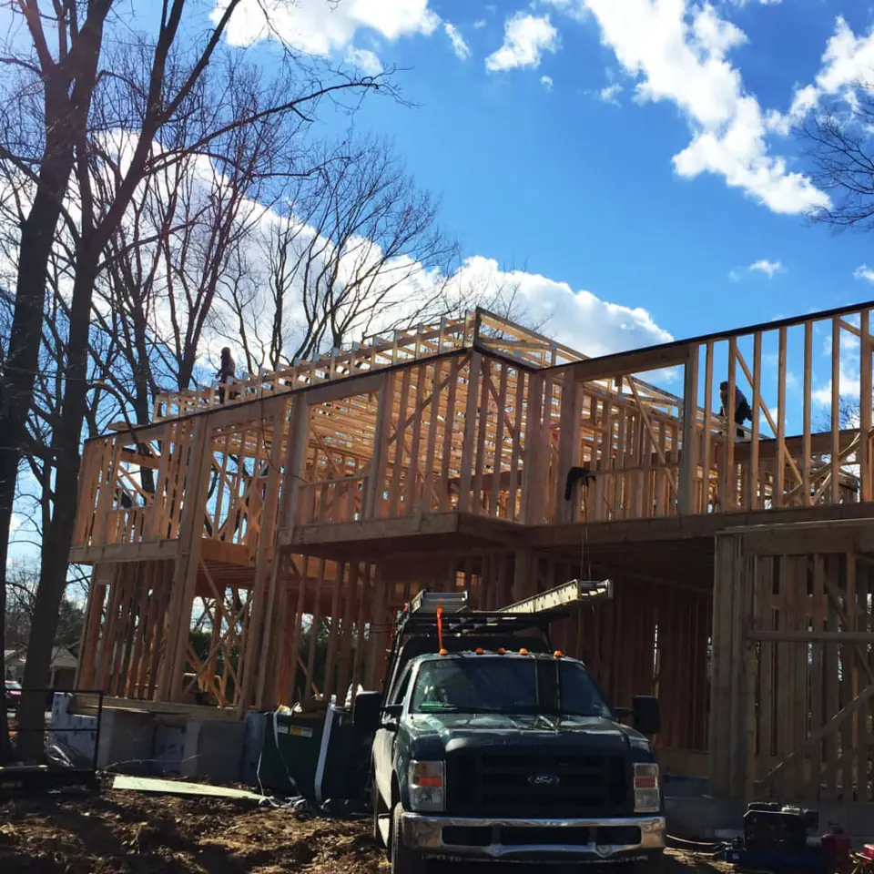Flat roof trusses are laid out. The longest run for the trusses in the main roof area is almost 40 feet with a continuous pitch of  1/4:12 w