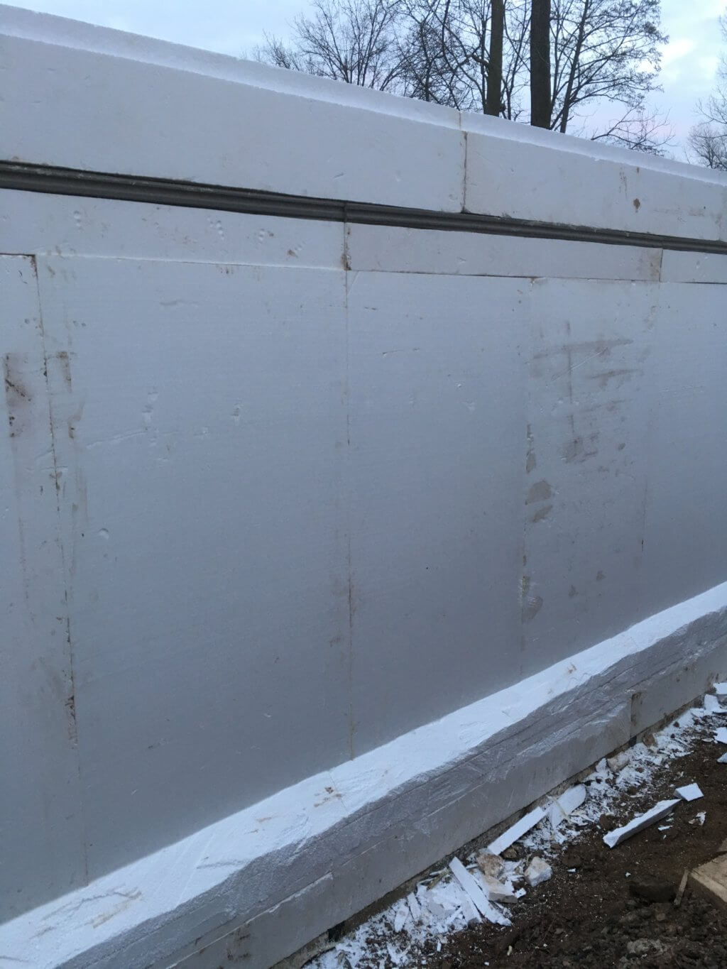 Foam inslutaion applied directly to conrete wall