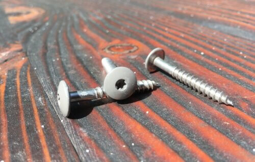 SFS Intec stainless steel fasteners with painted heads to match the panels