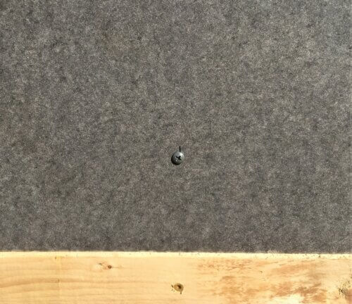 Pilot fastener to hold the fiber cement panel in place